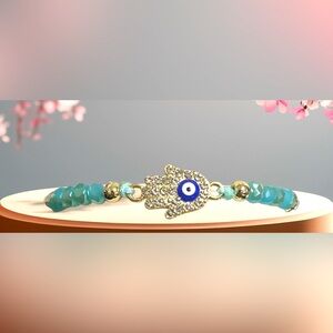 Elegant Gold and Blue Hamsa Bracelet